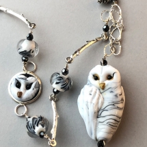 CAB16, Snowy Owl on a Branch Necklace, Cheryl Brown, Lampwork Beads, Sterling Silver and Pewter findings, $165